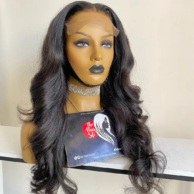 Lace wig with a pre - bleached knot for a natural - looking scalpKIKI 6 X 6  | 13 X 6 WAVY WIG