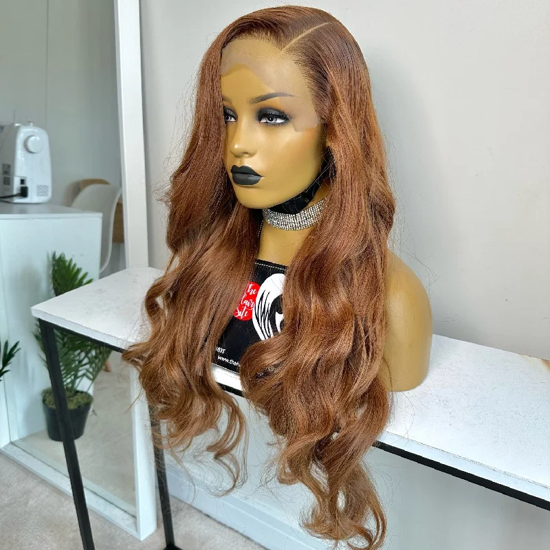 Adjustable - cap lace wig for a comfortable fitUCHE 6 X 6 BROWN WAVY GLUELESS WIG