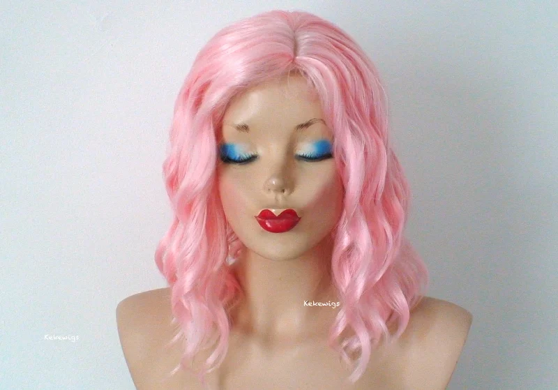 Colored wig with a curly texture for a bold and stylish choice16" Peach Pink Short Wavy Hairstyle Wig