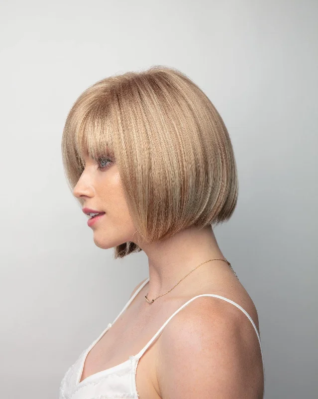 Short wig with a wavy texture for a beachy and relaxed lookHailey - Ferdinand's Heat Friendly Short Bob Wig- open cap